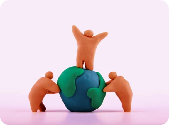 An illustration of a globe supported by 3 people